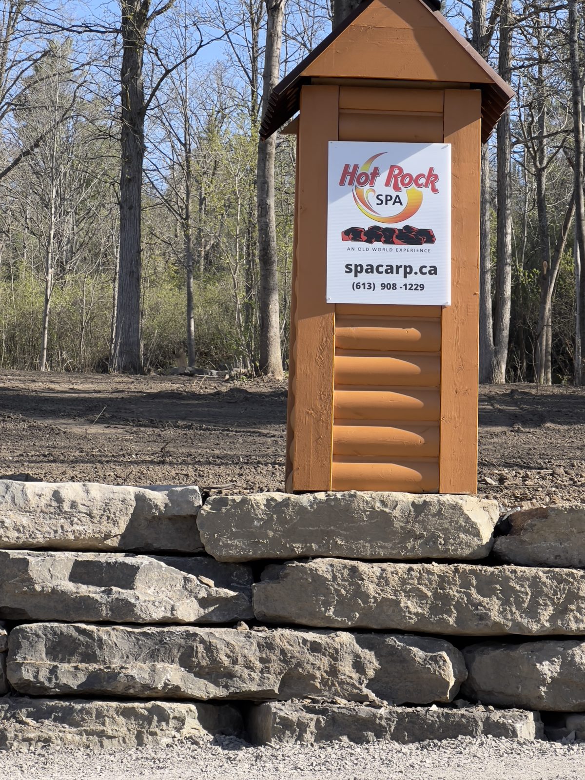 Hot Rock Spa entrance sign in Carp